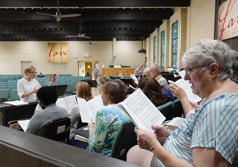 adult choir rehearsing